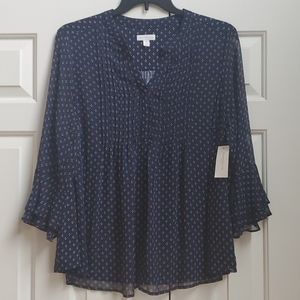 Navy blue and white pleated blouse